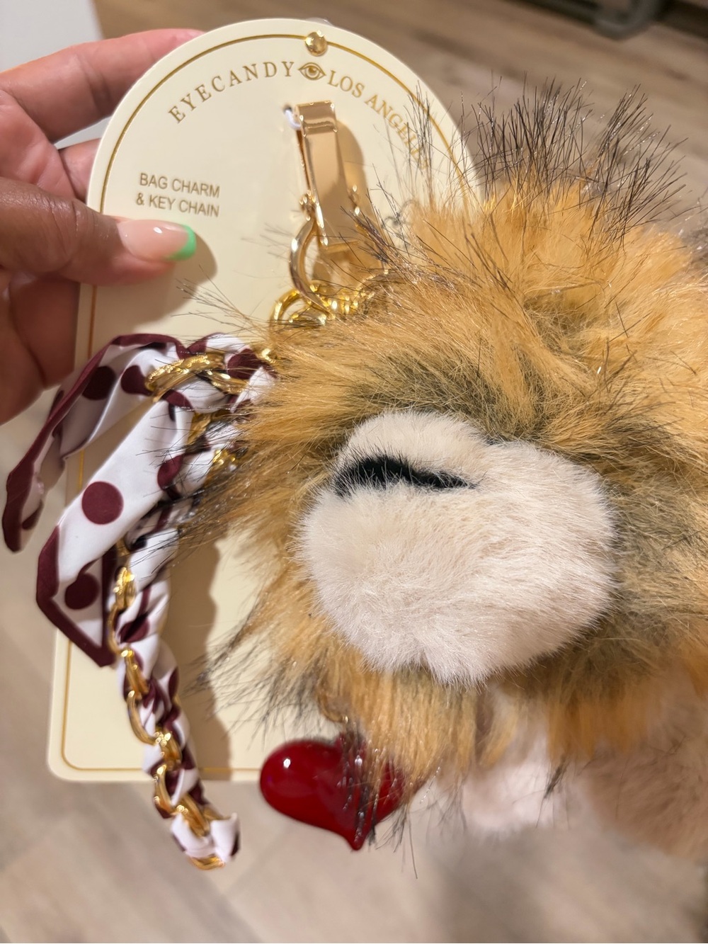 EYECANDY Viral lion 🦁 Faux Fur Pom Bag Charm